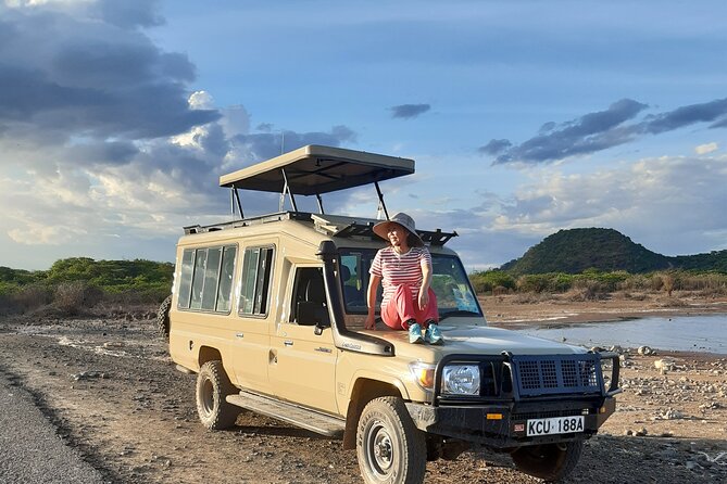 4 Day Group Tour to Maasai Mara and Lake Nakuru by a 4WD Cruiser - Getting picked up in Nairobi, then settling into the 4WD routine