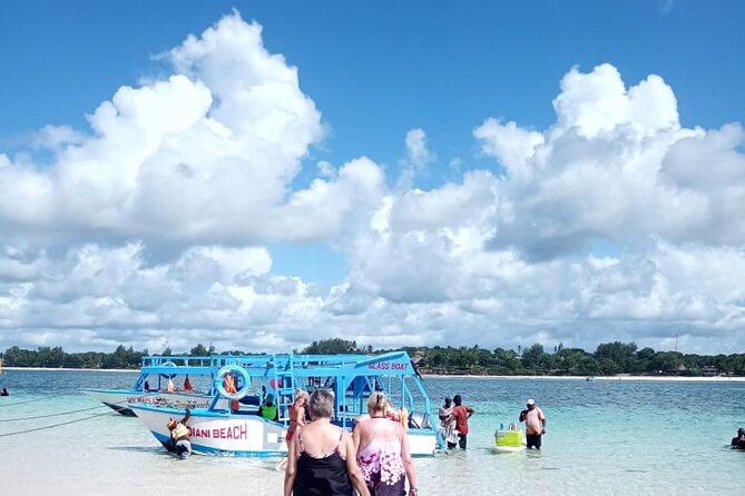 Diani Beach: Glass-bottom Boat Ride with Underwater Show - Transparent-bottom viewing plus the captain’s narration about corals and conservation