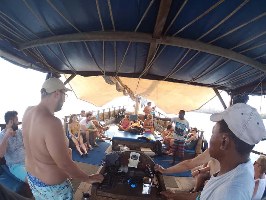 Diani Beach: Kisite Marine Park Dhow & Snorkeling with Lunch - Wasini Island lunch at a cliff-top restaurant, plus tide and foot comfort