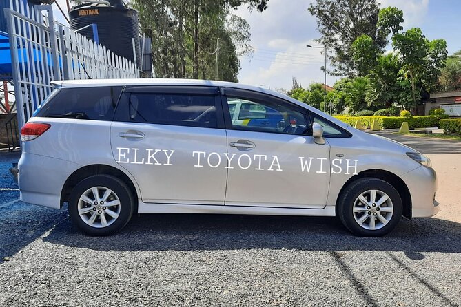 Elkydianibeachtaxis - The pickup system: name sign, WhatsApp, and no guessing