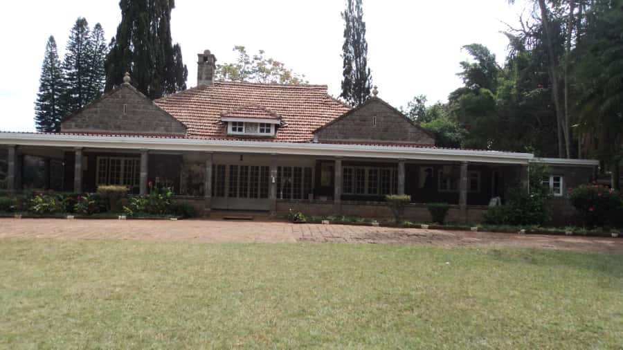 Giraffe Center and Karen Blixen Museum Tour from Nairobi - Getting There by Van: Pickup Time and Realistic Pacing