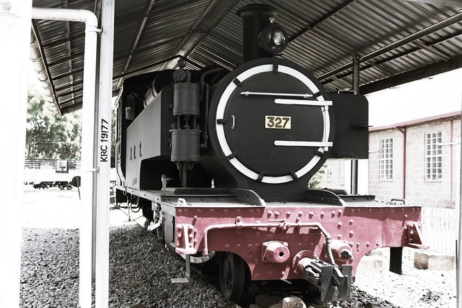 Half Day - Nairobi City Walking/Bus Tour Museums, Monuments & Rooftop City View - National Archives: Art, Independence-Era Stories, and Everyday Objects