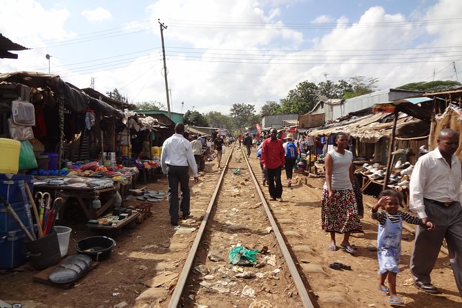 Kibera Slum Experience with Local Guide Born There - Hotel transfers, driver and guide, and what the $49 price actually buys