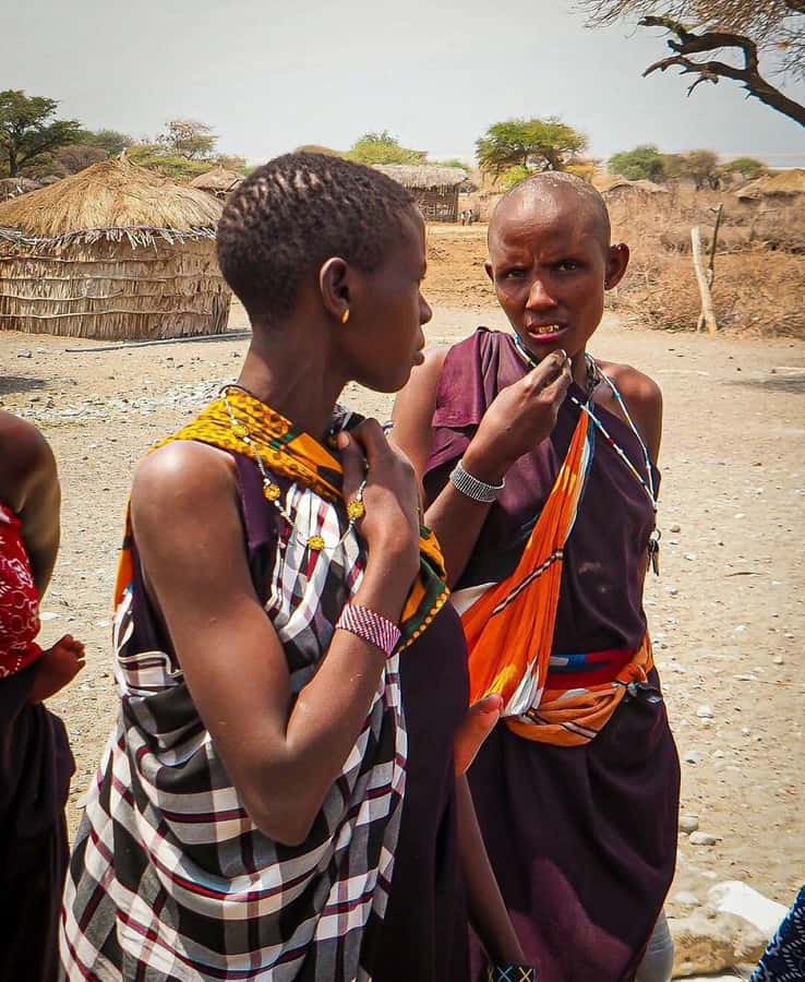 MASAI VILLAGE CULTURAL EXPRIENCE DAY TOUR. - Entering the village: the photo stop and early-light timing