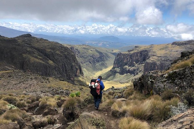Mount Kenya Trek - Day 2’s climb to Shipton Camp: Moorland, river crossings, and big valley views