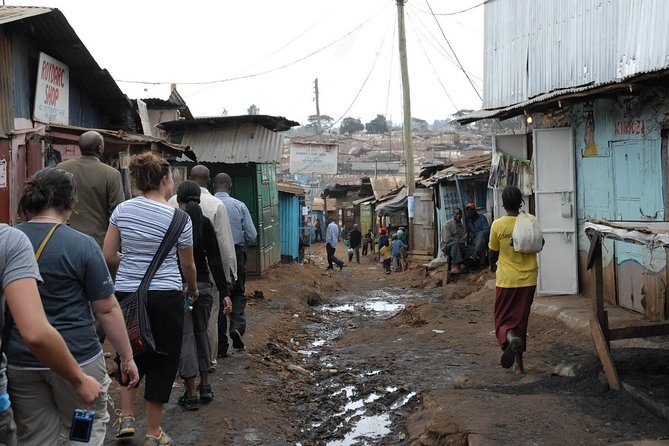 Nairobi Guided Tour to Kibera Slums - Stepping into a typical home and asking good questions