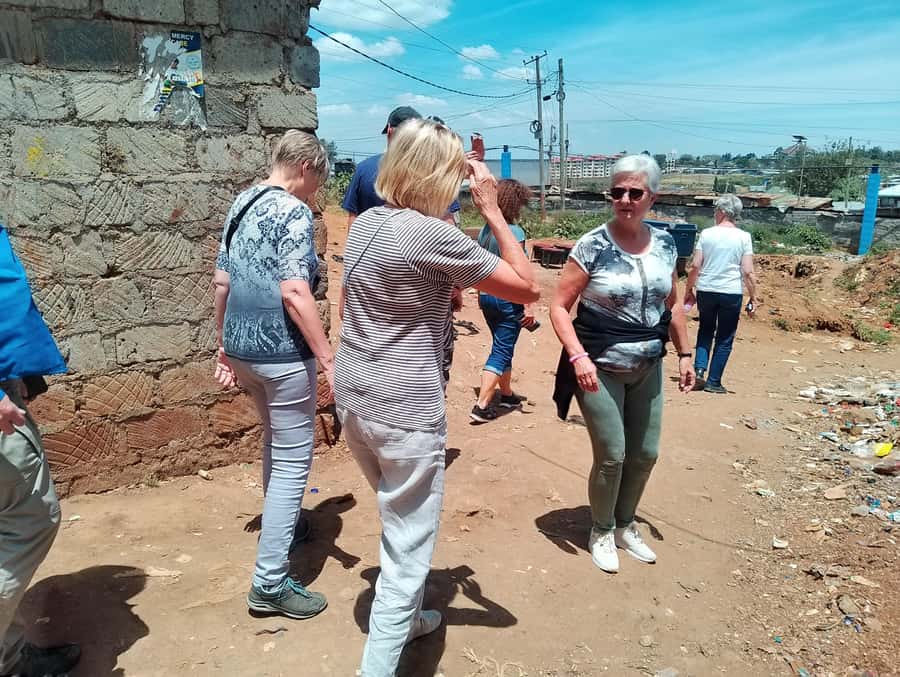 Nairobi: Kibera Slum storytelling tour with a Local - The alley maze with guides like Elijah and Peter