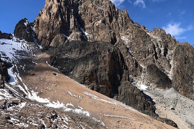 Private 4 Day Mount Kenya Treks - Day 2: heather and golden moorland, refill streams, and Mintos Camp views