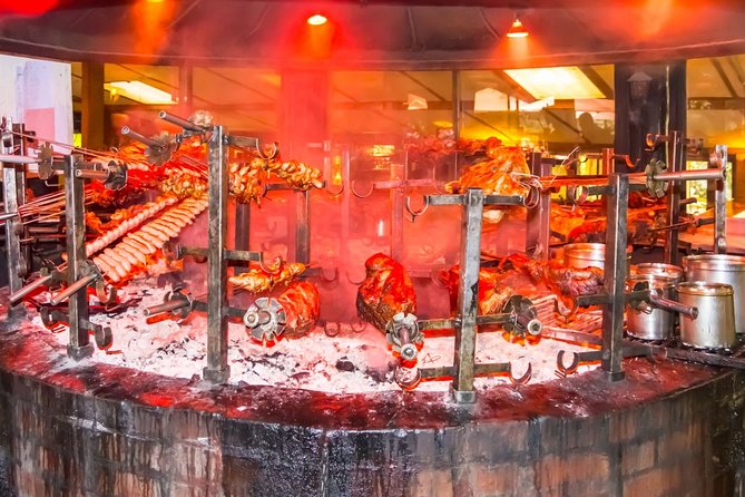 The Carnivore Restaurant Experience in Nairobi: Lunch or Dinner - Swords, charcoal pit, and that Nairobi banquet mood