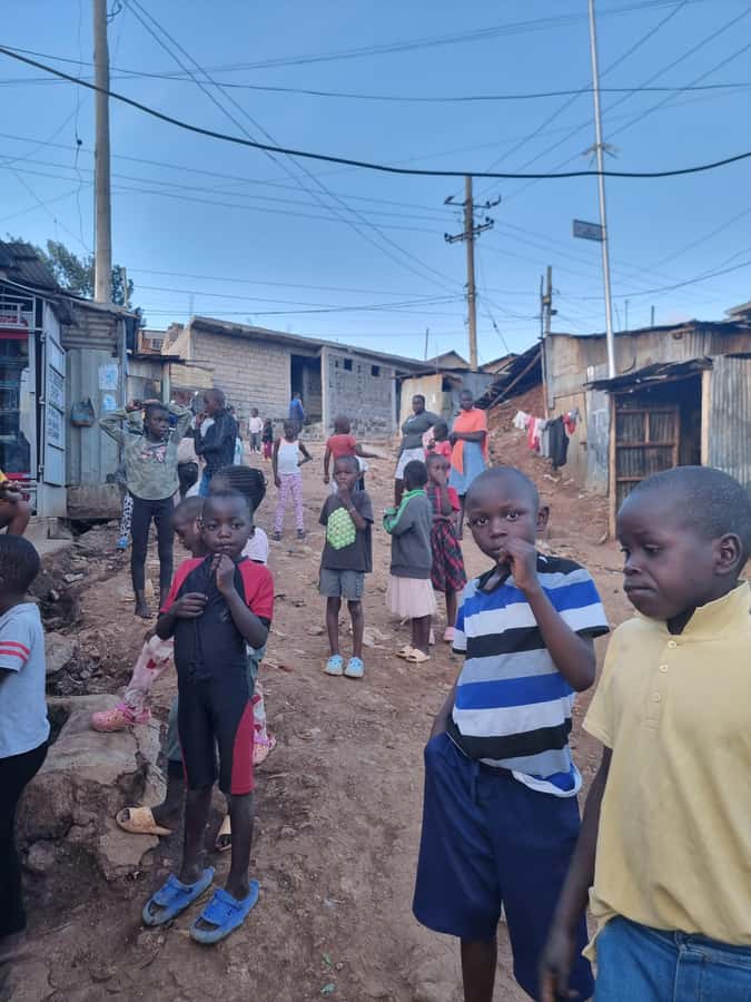 Visit Kibera The Largest Slum With a Local - Stop 5: cafeteria time, local foods, soft drinks, and tea with mechanics
