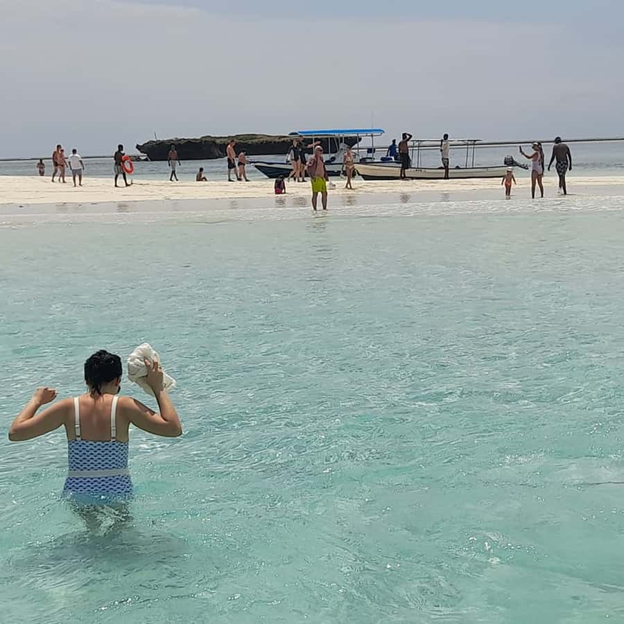 Wasini island: Marine Park, Dolphin Watch & Village Tour - Lunch near Shimoni: coconut rice and fish, with optional upgrades